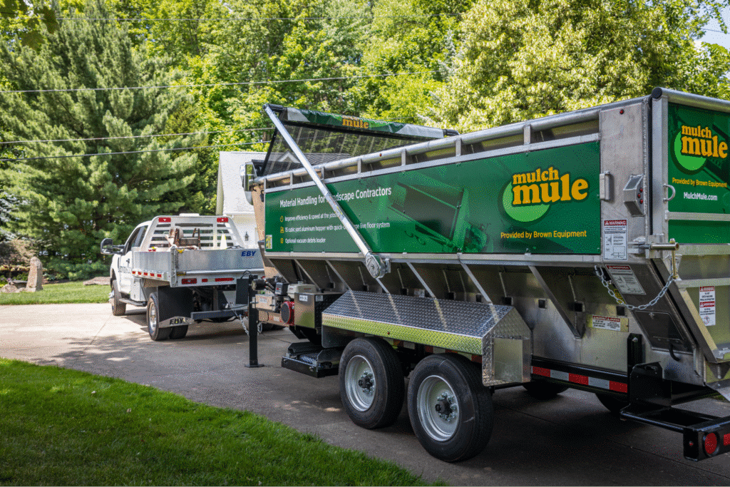 Efficient mulch mule trailer for easy lawn maintenance and landscaping services.