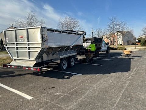 Mulch Mule trailer ready for landscaping projects in a parking lot.