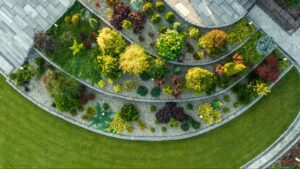 Lush garden landscape with vibrant flowers and greenery in an elegant design.