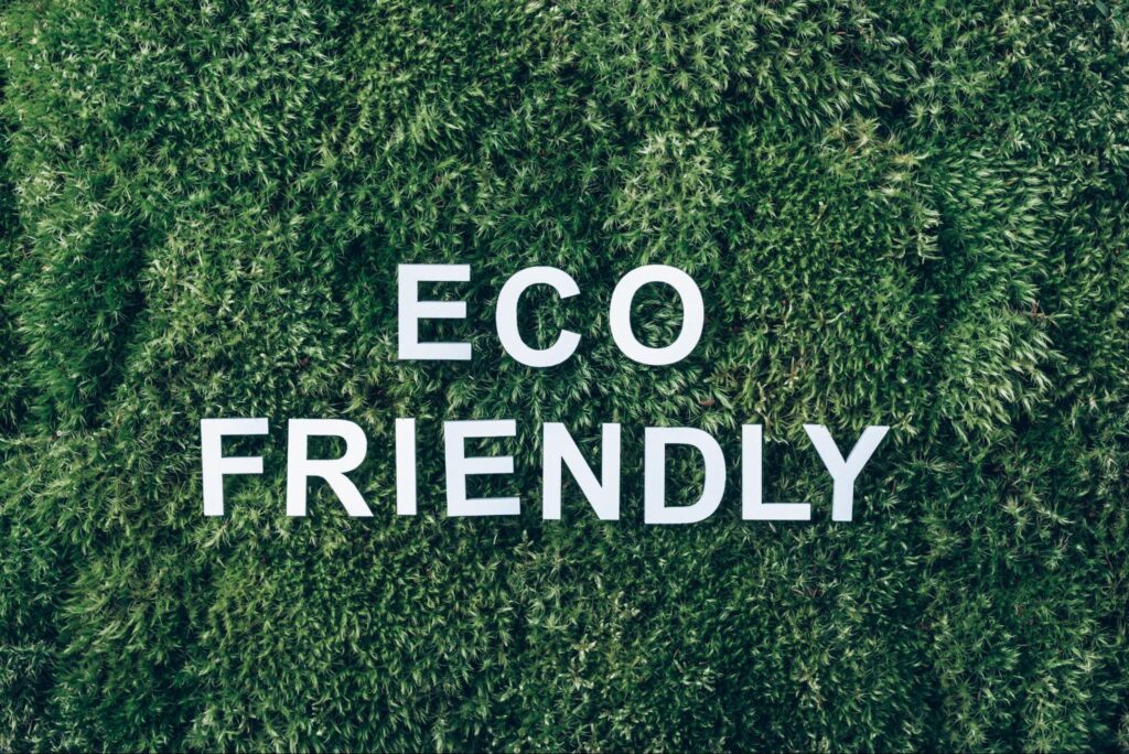 Eco-friendly message on grass promoting eco-friendly landscaping materials