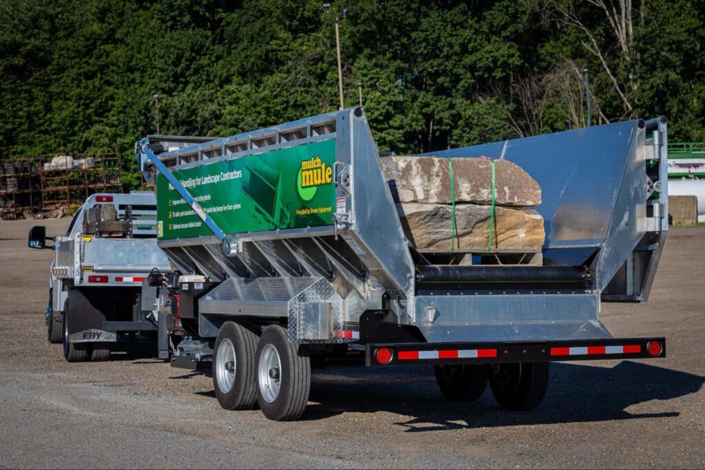 Heavy-duty trailer loaded with construction materials, ready for easy transport.